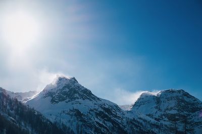 Scenic view of snowcapped mountain against sky