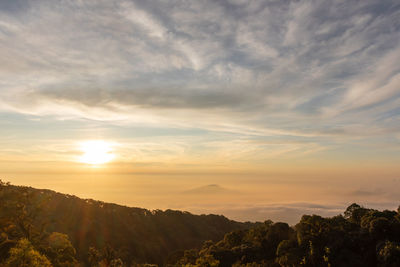 Scenic view of mountains against sky during sunset