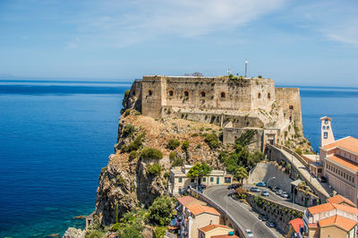 High angle view of building by sea