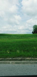 Scenic view of field against sky