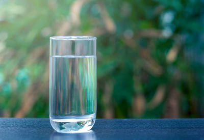 Close-up of glass of water on table