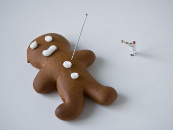 High angle view of cookies on table against white background