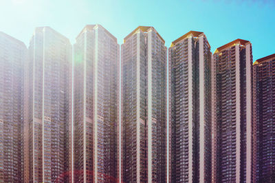 Low angle view of modern buildings against sky