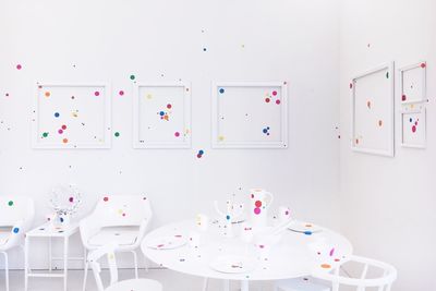 Colorful decorations hanging on white background