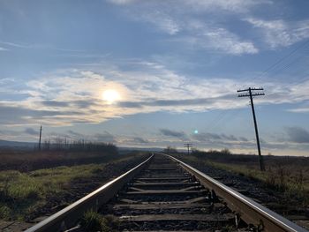 Railroad tracks against sky