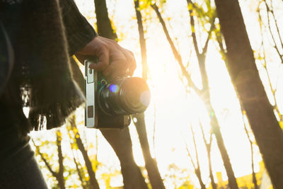 Man photographing through camera