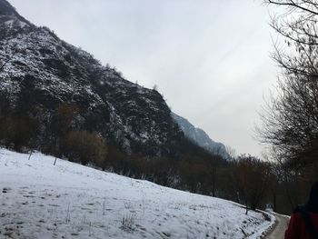 Scenic view of mountains against sky during winter