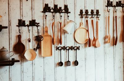 Kitchen utensils hanging on wall