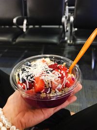 Close-up of hand holding fruit