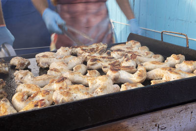 Midsection of man preparing food