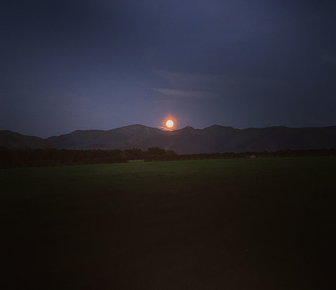 SCENIC VIEW OF LAND AGAINST SKY AT NIGHT