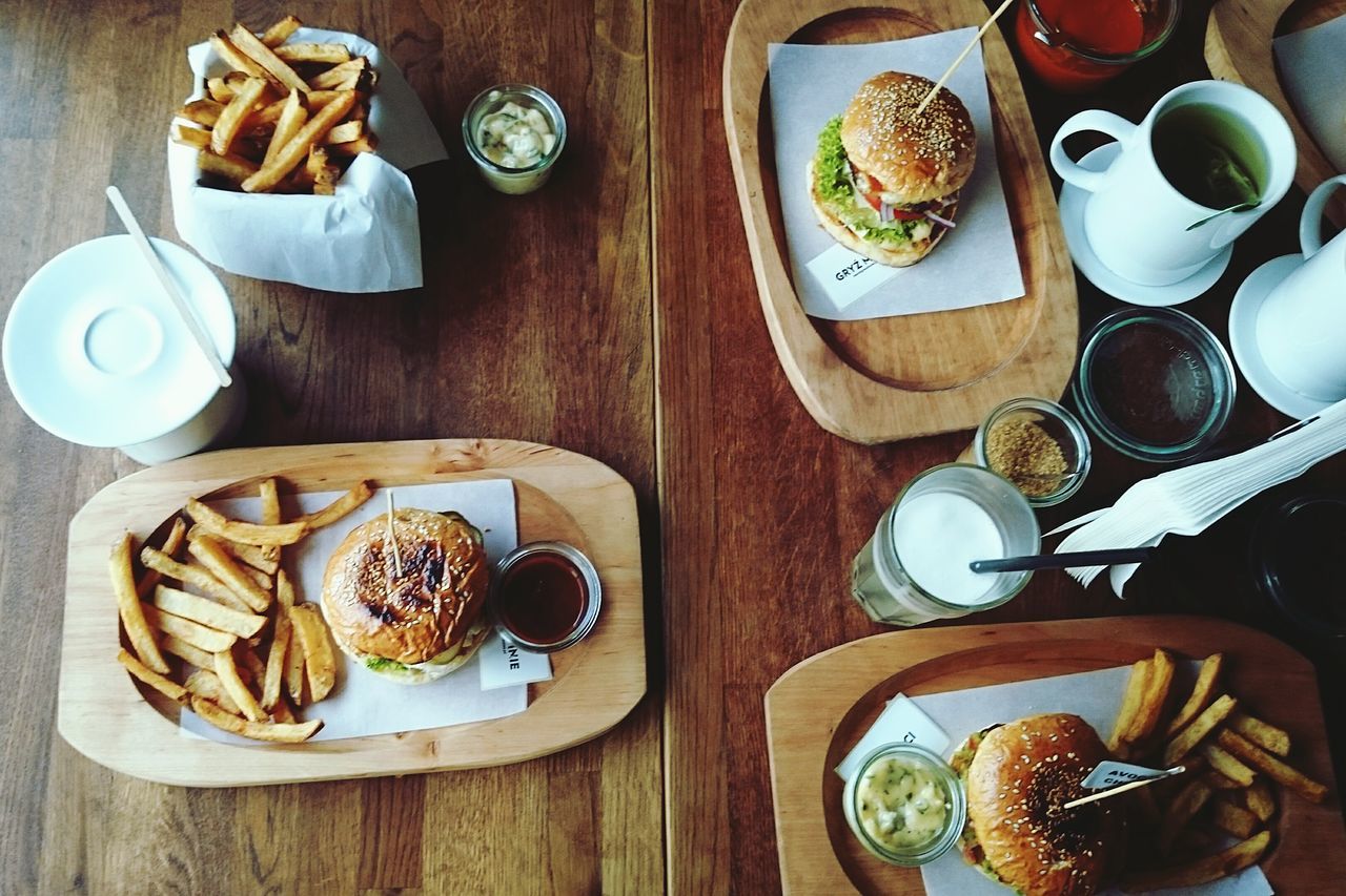 food and drink, food, indoors, freshness, table, ready-to-eat, plate, still life, high angle view, drink, indulgence, bread, breakfast, healthy eating, sweet food, serving size, refreshment, directly above, meal, fork