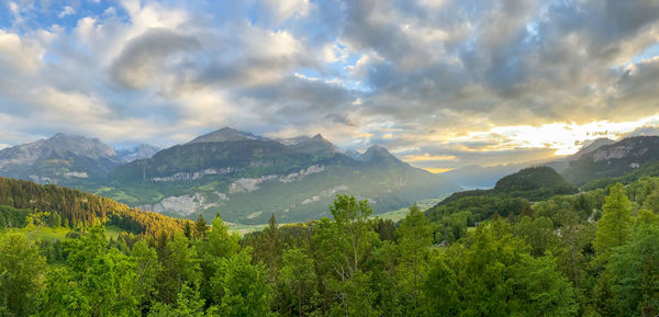 Scenic view of landscape against sky during sunset