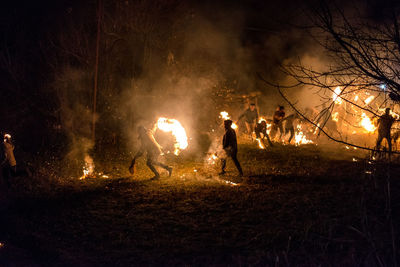 Group of people by bonfire