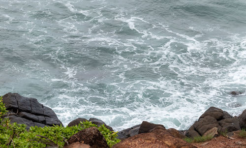 High angle view of rocks on beach
