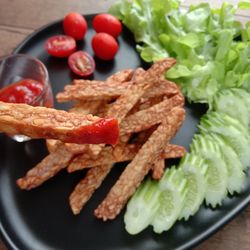 High angle view of salad in plate on table