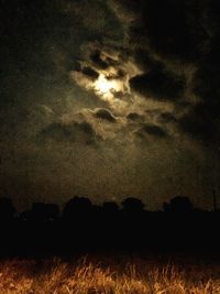 Scenic view of landscape against sky at night