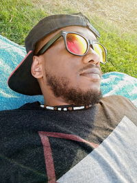 Portrait of young man wearing sunglasses