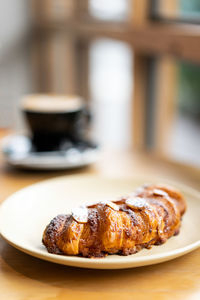 Close-up of coffee served on table