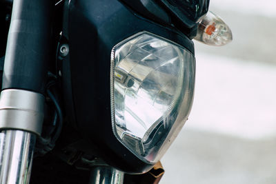 Close-up of motorcycle headlight