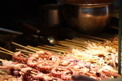 Close-up of meat on barbecue grill