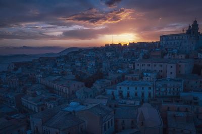 High angle view of townscape against sky during sunset