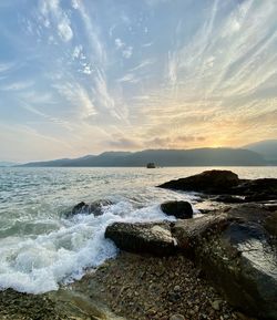 Scenic view of sea against sky during sunset