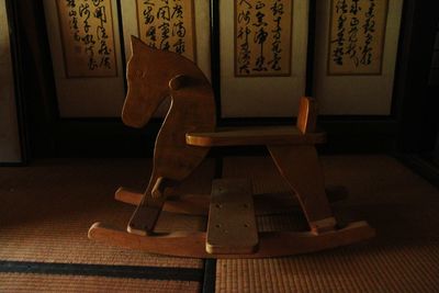 Close-up of empty chair at home