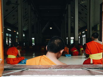 Rear view of people in temple