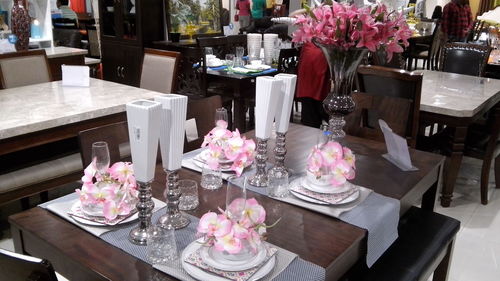 View of orchid flowers on table