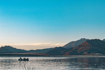 Scenic view of lake against clear sky