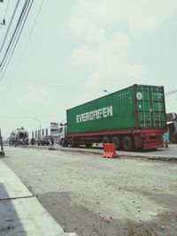 Train on railroad track against sky