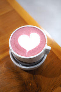 Close-up of red velvet on table