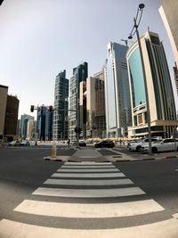 View of city street against clear sky