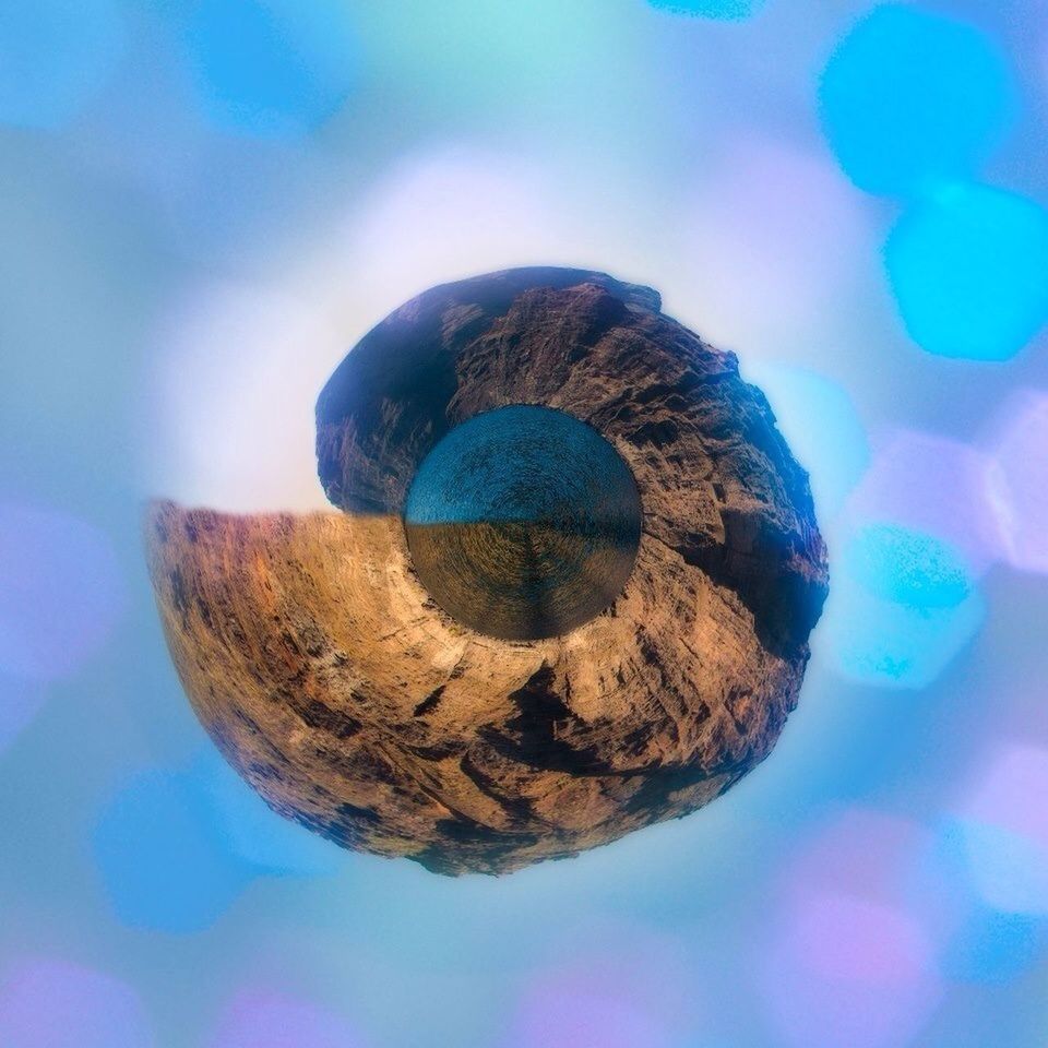 blue, close-up, reflection, circle, selective focus, multi colored, no people, focus on foreground, indoors, pattern, nature, water, day, beauty in nature, purple, natural pattern, sphere, high angle view, underwater