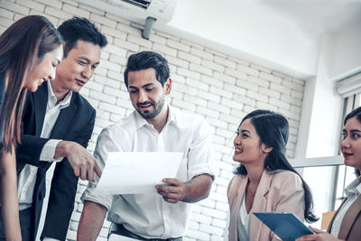 Business colleagues working at office