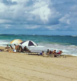 Scenic view of beach against sky