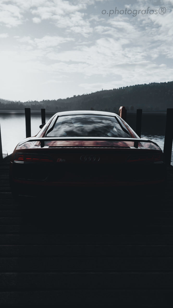 REAR VIEW OF BOAT IN LAKE