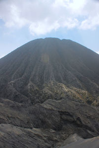 Low angle view of mountains against sky