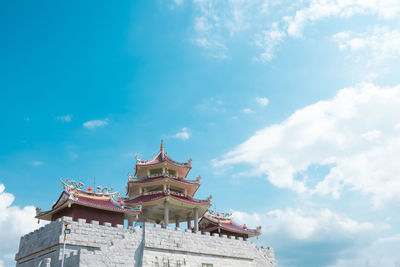 Low angle view of temple building against sky