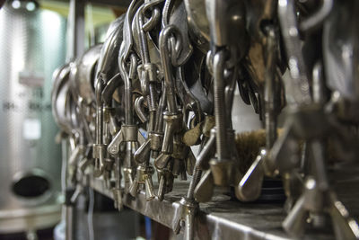 Close-up of machine parts on shelves