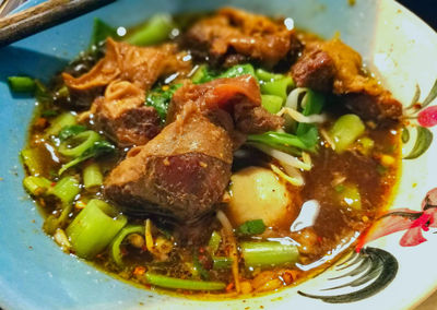 Close-up of served food in plate