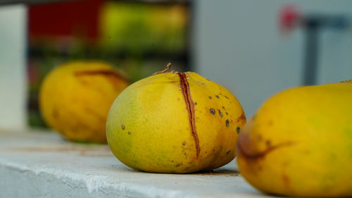 Close-up of oranges on table