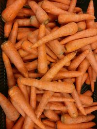 Full frame shot of carrots for sale at market