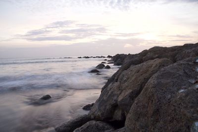 Scenic view of sea against sky at sunset