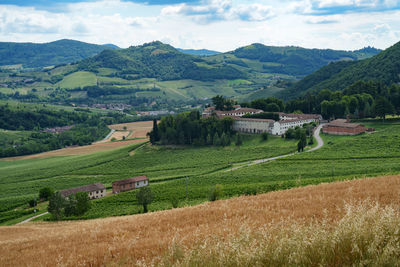 Scenic view of agricultural field against mountains