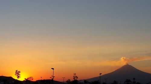 Silhouette of mountain at sunset