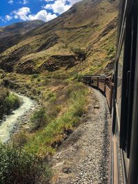 Scenic view of train against sky