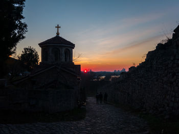 Historic building against sky during sunset