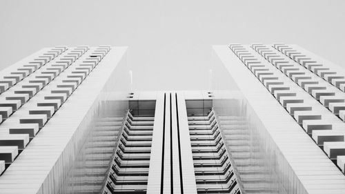 Low angle view of skyscraper against clear sky